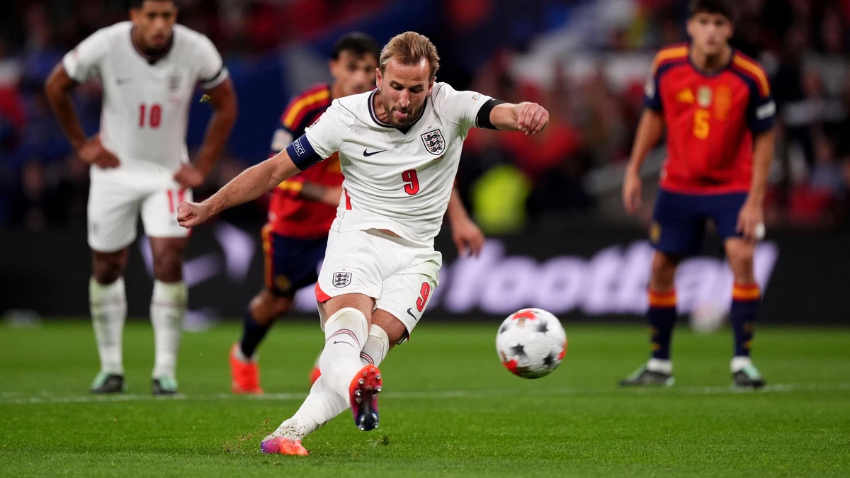 Harry Kane strikes his penalty against Spain at Wembley before it hit the crossbar